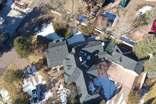 Drone view of a complex completed roofing system